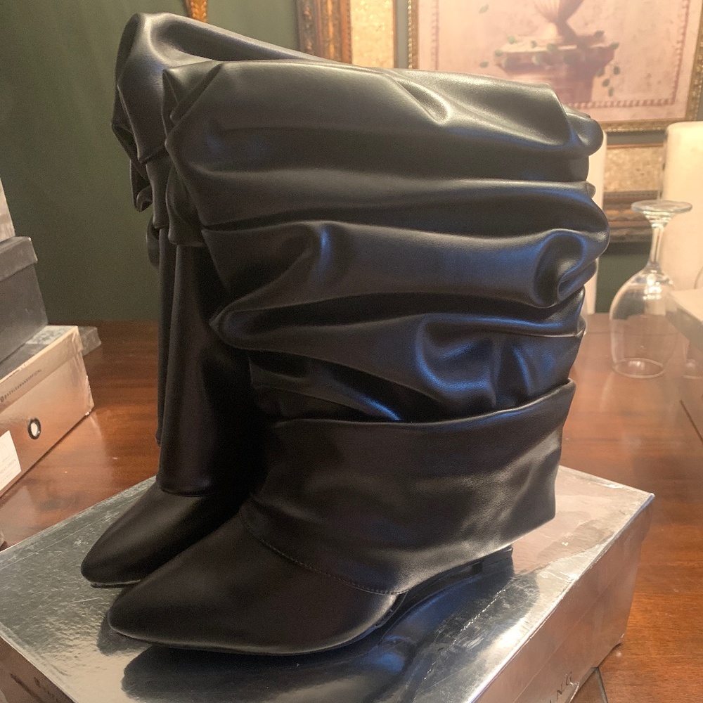 Azaela Wang  Black Heeled boots